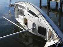 capsized sail boat